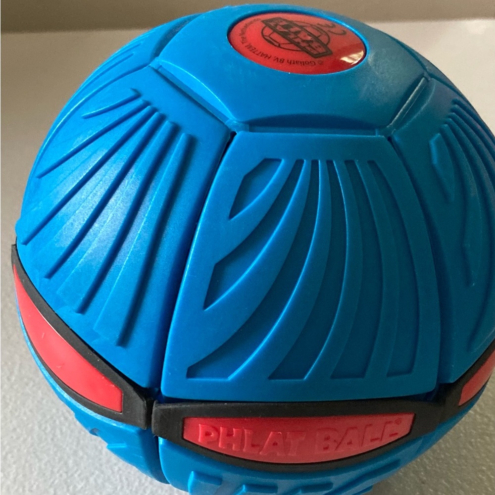 Phlat Ball by Goliath Games Transforms From Frisbee Disc to Ball When Thrown
